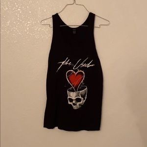 The used black tank top size L
